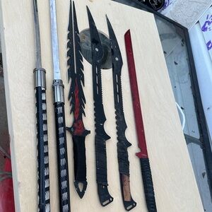 Set of Black and Red Decorative Swords and Knives